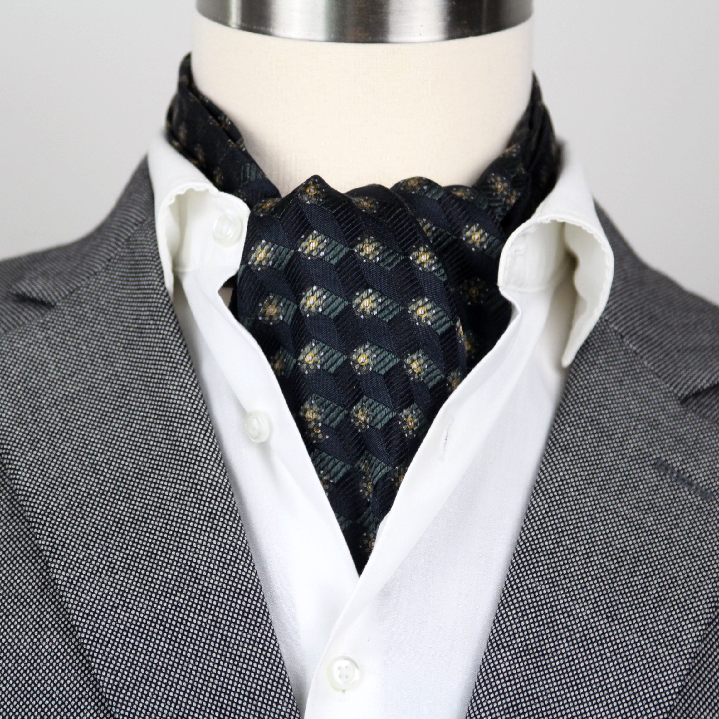 Mannequin wearing a gray suit with a white shirt and Black Mens Ascot