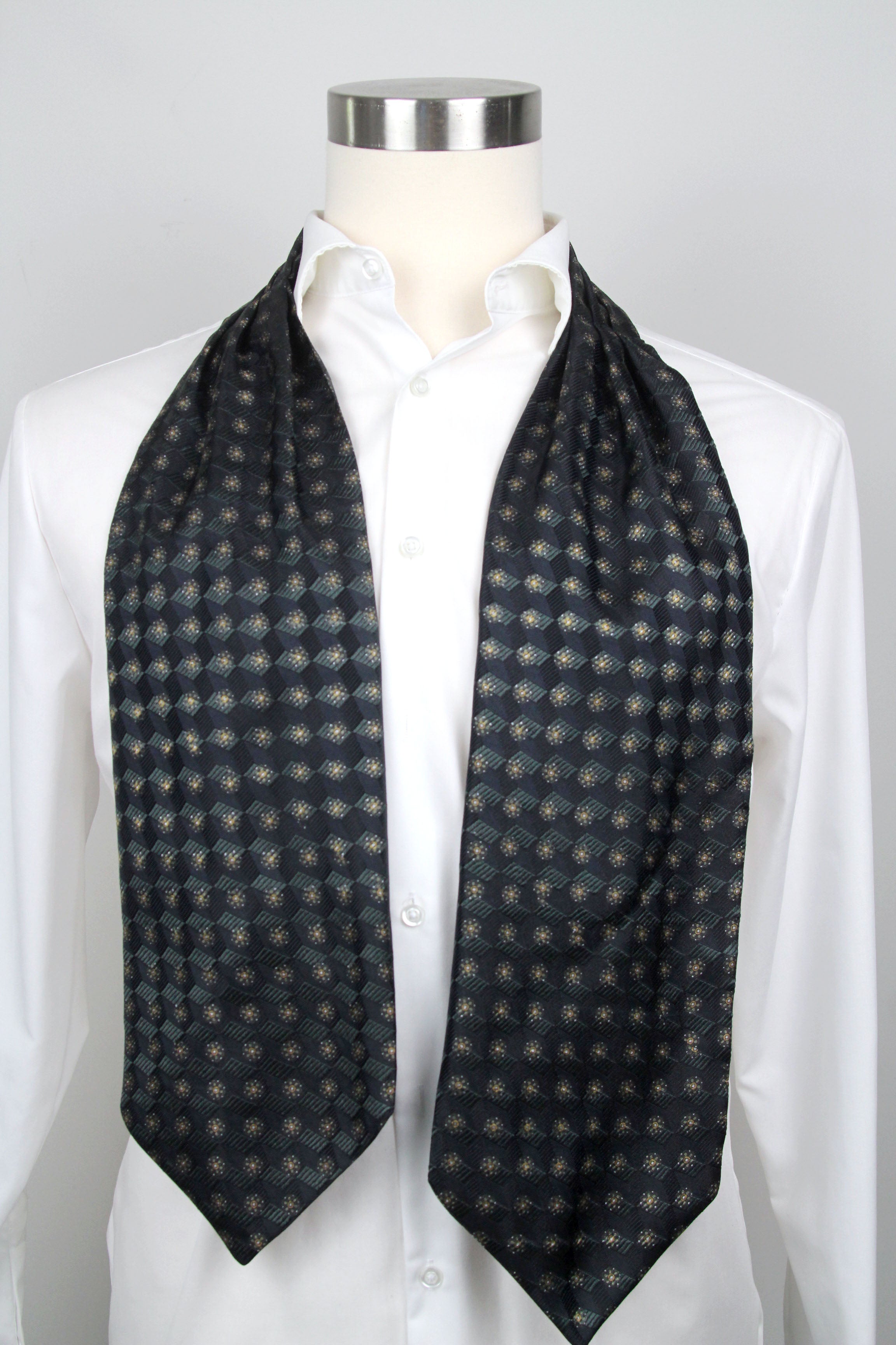 Mannequin wearing a white shirt with a Black Mens Ascot draped over the shoulders against a gray background
