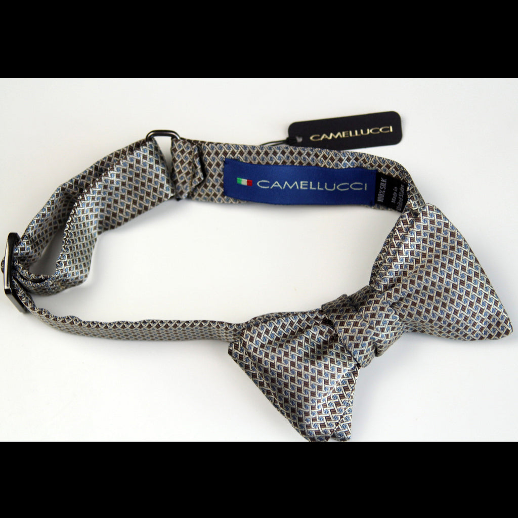 Patterned bow tie with Camellucci label on a white background