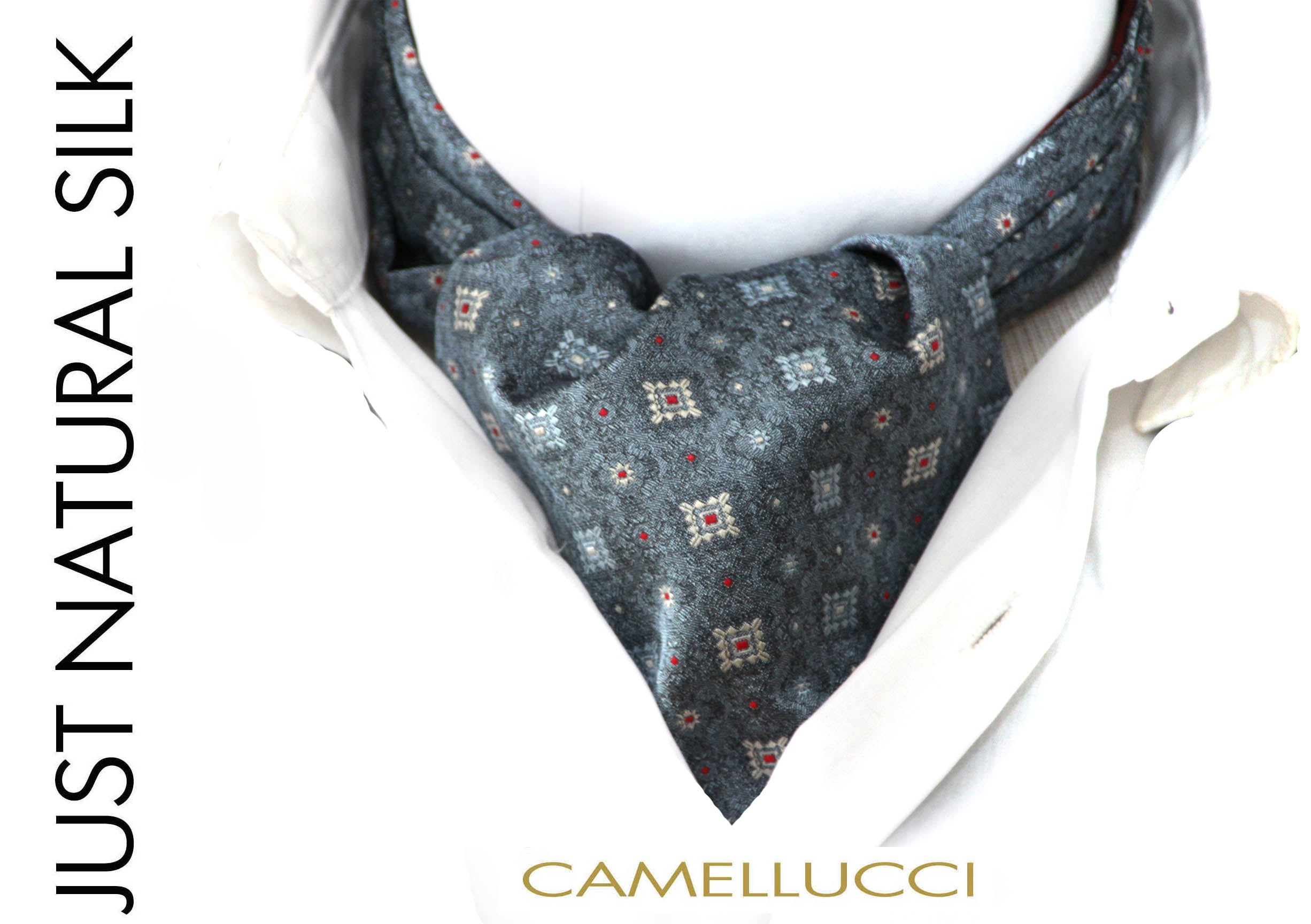 Patterned silk cravat on a white shirt with 'Camellucci' branding.