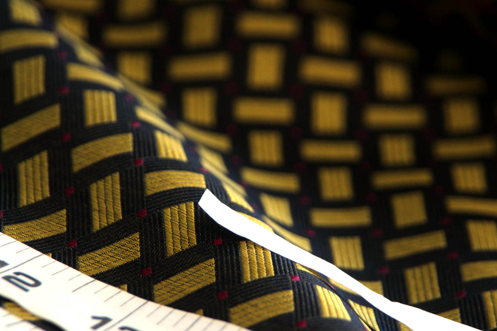 Woven details for Black Gold Ornament Silk Fabric with White contrast
