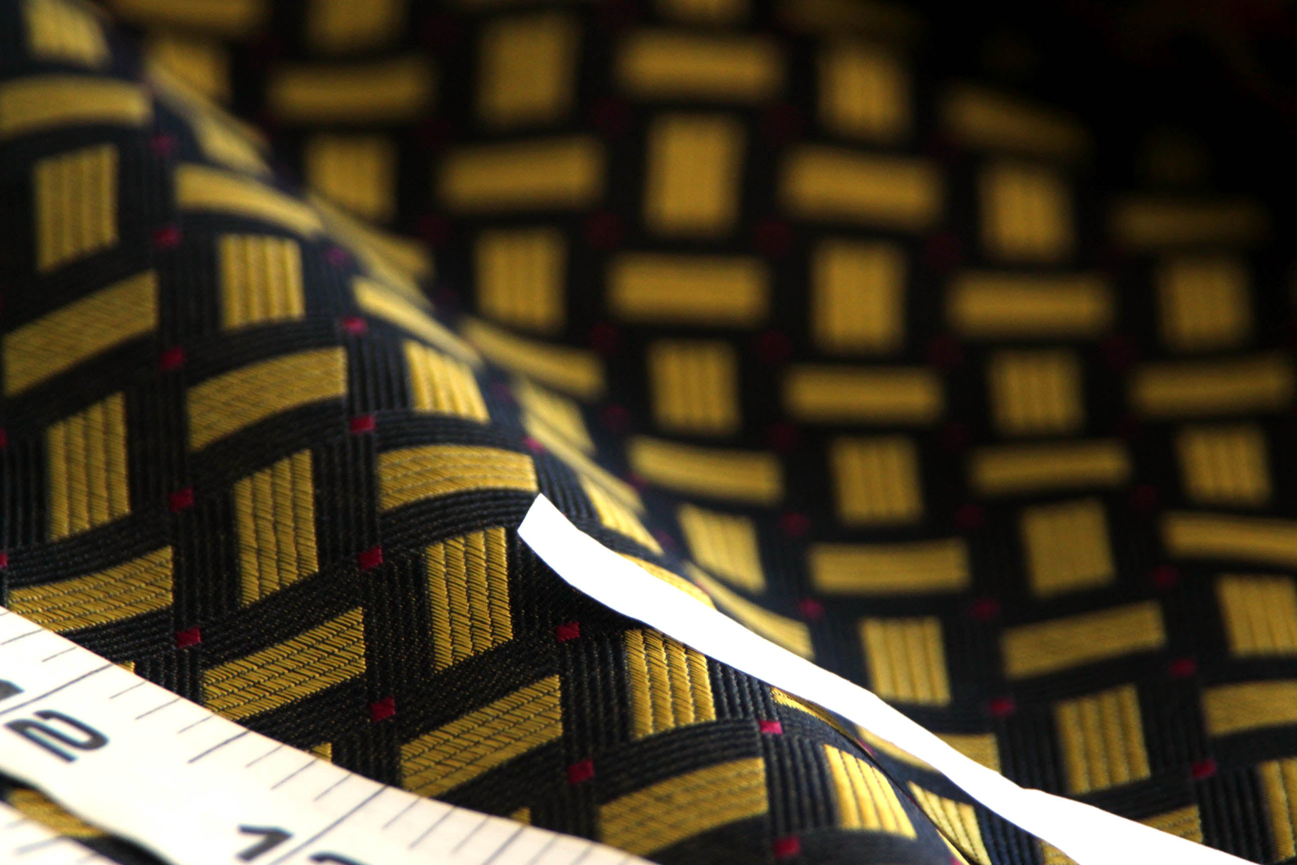 Woven details for Black Gold Ornament Silk Fabric with White contrast